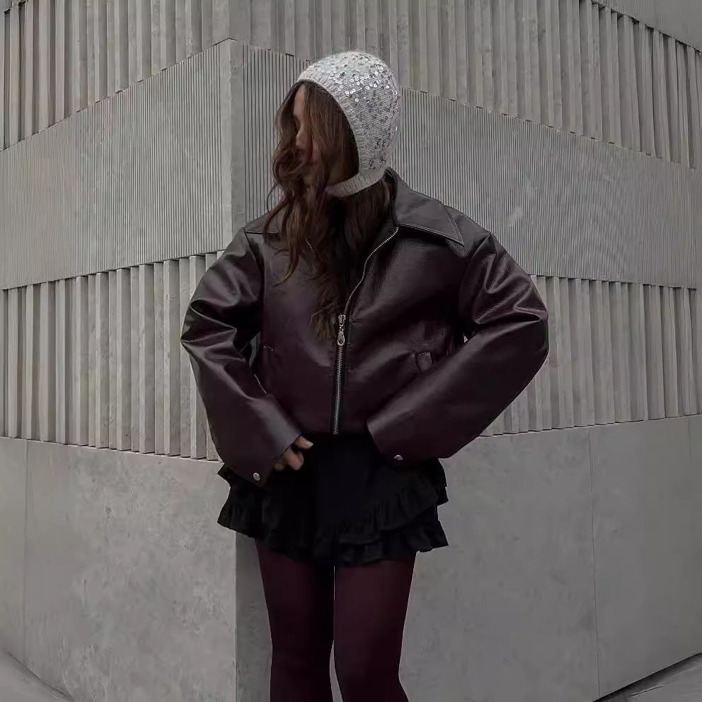 Chaqueta de cuero con cremallera de color liso